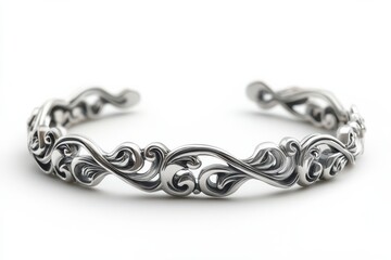 Obraz premium Elegant silver filigree cuff bracelet intricate floral design showcasing timeless beauty on white