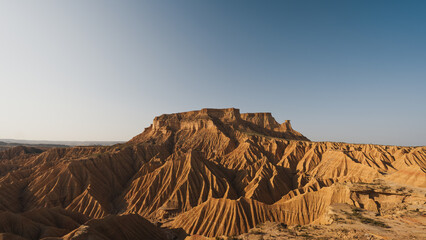 Eroded landscape of bardenas reales natural park in navarra, spain, resembling a desert