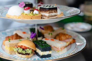 Elegant Afternoon Tea Set with Savory and Sweet Pastries