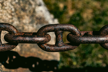 Photo of chain on stone