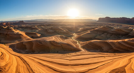 Naklejka premium Spectacular desert landscape at sunrise golden hour panoramic view of sandstone formations and vast canyons