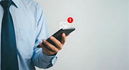 Businessman Checking Smartphone with New Email Notification Icon on Light Gray Background – Concept of Digital Communication, Productivity, and Networking – Copy Space