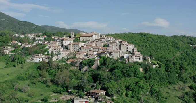 Medieval village of Castelnuovo di Farfa in Italy, suitable for travel guides, history blogs, educational materials, and cultural websites. Illustrates architectural charm and historical significance.