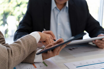 Senior businessmen analyzing data.