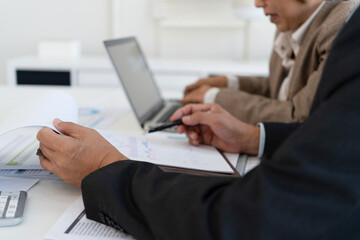 Senior businessmen analyzing data.