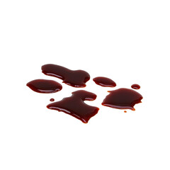 Obraz premium Puddle of dark red liquid is spread across surface, resembling spilled wine or juice. glossy texture and irregular shape create realistic and dramatic effect