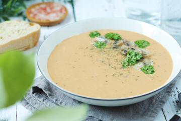 A bowl with mushroom cream soup	