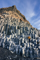 Reynisfjara black sand beach and basalt column mountain (South Iceland)