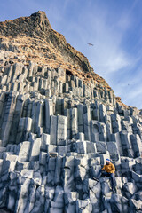 Reynisfjara black sand beach and basalt column mountain (South Iceland)