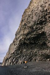 Reynisfjara black sand beach and basalt column mountain (South Iceland)