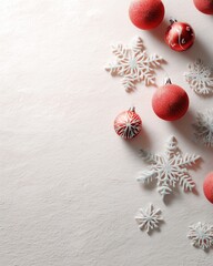Christmas scene with red ornaments and white snowflakes on a light pink background. Festive holiday decorations creating a joyful atmosphere.