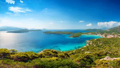 panoramic seascape view with a beautiful bay on a sunny day view from above at vourvourou village greece europe horizontal banner