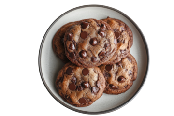 Delicious double chocolate chip cookies a tempting treat on a gray plate Soft lighting close up view