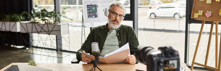 Focused professional engages in a virtual meeting surrounded by a modern office environment