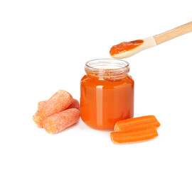 Baby food. Taking tasty puree from jar with spoon on white background