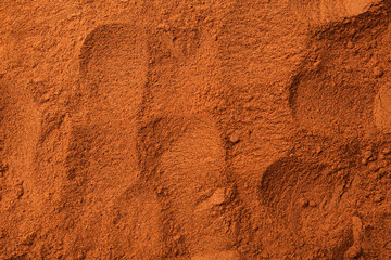 Superfood. Cinnamon powder as background, top view