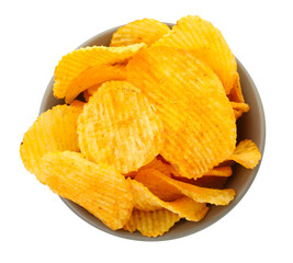 Tasty ridged chips in bowl isolated on white, top view