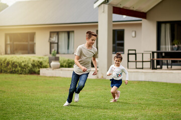 Children, running and playful game in backyard with energy, fun chase and race for bonding together. Kids, boy and girl with movement for exploring activity, creative adventure and childhood at house