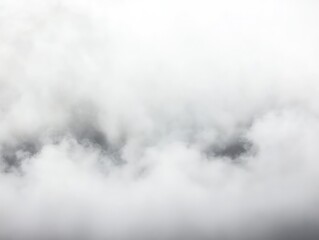 Fototapeta premium Dense white clouds form a misty atmospheric landscape with a soft light gradient creating a serene and abstract ambiance