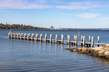 A wooden jetty at Point Walter Reserve (Dyoondalup) on the Swan River, Perth, Western Australia, WA, Australia