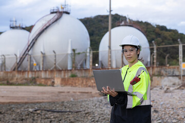Female engineer communicates with colleagues to discuss natural gas separation issues