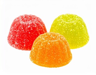 Three dome-shaped sugar-coated fruit jelly candies in red-orange, bright green, and yellow isolated on white