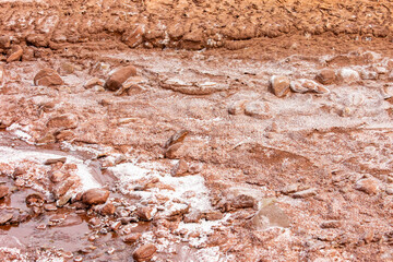 Salt-crusted waters of Moab’s desert landscape reflect the harsh beauty of nature, where evaporation leaves behind a stunning mineral-rich terrain