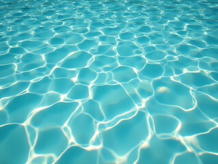 Crystal clear water reflects sunlight in a serene and inviting setting.