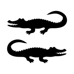 Obraz premium Silhouette of two crocodiles with sharp teeth and spiked tails