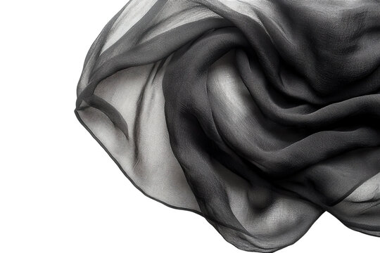 Elegant black sheer fabric softly draped showcasing texture and subtle light play on white - Powered by Adobe