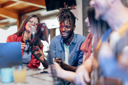 Content creators recording a podcast in a modern studio