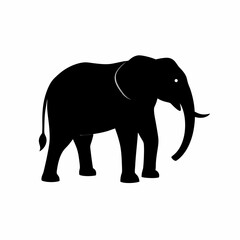 Obraz premium Silhouette of a black elephant with tusks and trunk raised