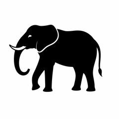 Fototapeta premium Silhouette of a black elephant with tusks and trunk raised