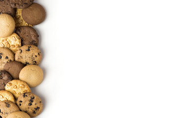 Set of different round cookies on white background with copy space, place for text.