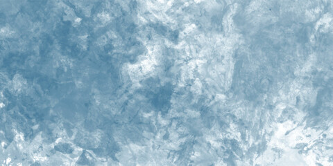 Artistic handmade watercolor background in pale blue with layered paint details

