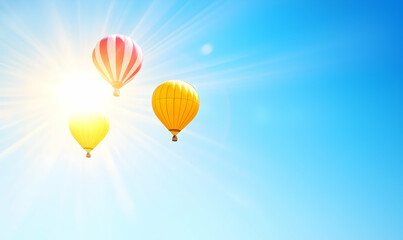 Fototapeta premium Balloons float in a vibrant blue sky, sun shining bright. Happy