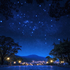 Naklejka premium Starry night sky over tranquil town with bright constellations and illuminated trees.