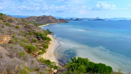 Coast with a view of small islands around Flores Island near Labuan Bajo, Indonesia