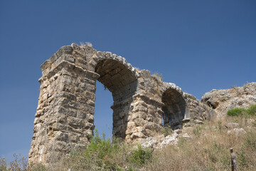 Türkiye aqueduct in Aspendos on a sunny autumn day