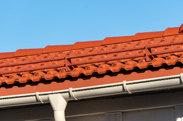 A building with red metal tiles