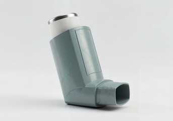 Close-up of a modern asthma inhaler ,  representing respiratory therapy, chronic condition management, or allergy relief. Ideal for use in medical promotions, pharmaceutical packaging 