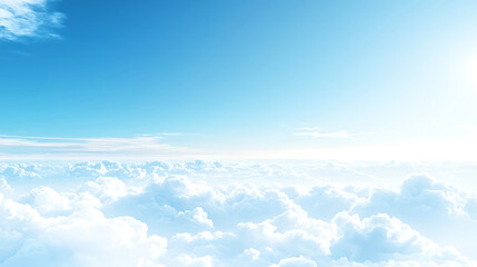 Aerial view of fluffy white clouds and bright blue sky creating a peaceful and serene atmosphere high above