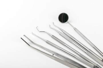 Dentist tools isolated on white background. Dentist Concept.Teethcare, dental health concept. Means to care for the oral cavity. Dental model and dental equipment. Dental hygiene. 