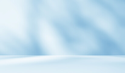 Empty blue room studio with shadow of leaves on concrete wall and floor for product presentation. Sunlight effect shadow. Minimal winter backdrop. Cosmetic, beauty and fashion showroom.