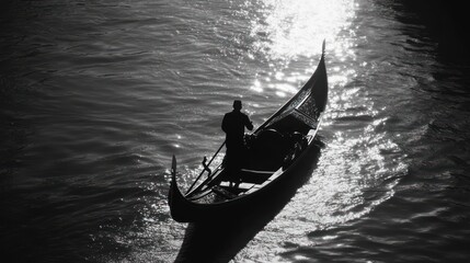 Fototapeta premium Gondola silhouette on water