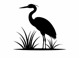 Black heron silhouette standing in a marsh with tall grass