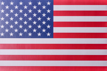 Fototapeta premium The national flag of the United States of America in white blue and red
