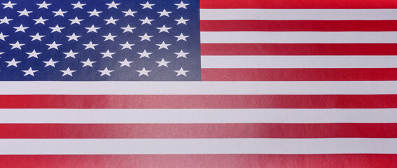 The national flag of the United States of America in white blue and red