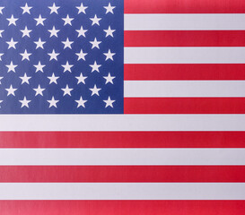 Naklejka premium The national flag of the United States of America in white blue and red