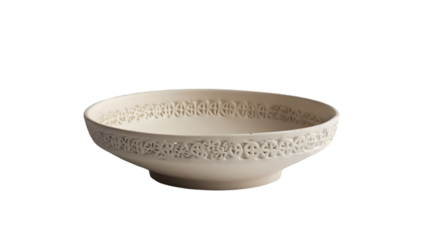 A decorative ceramic bowl with intricate cutouts on a  transparent background providing contrast and focus 